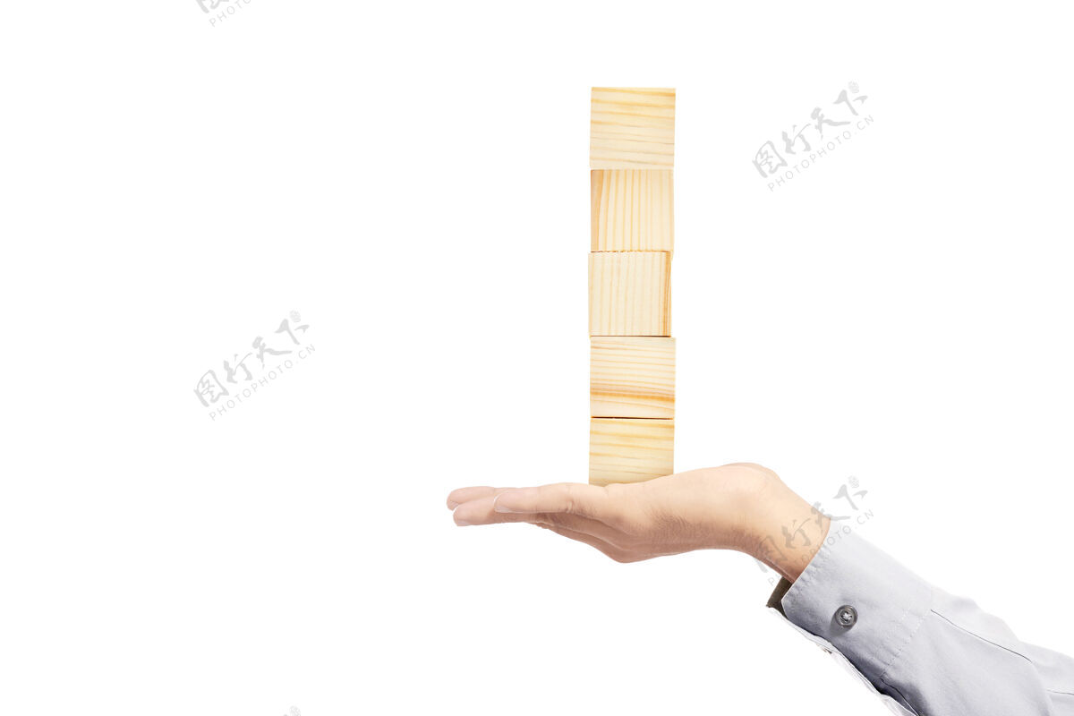 砖块手握成堆的木块玩具隔离在白色背景上形状手物体