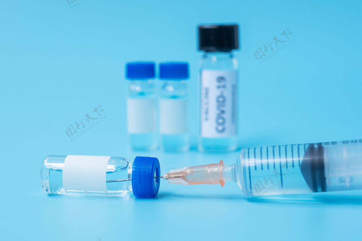 科学冠状病毒19疫苗瓶及注射针管在医院的应用实验室.医学 健康 预防接种和免疫理念液体流行病注射