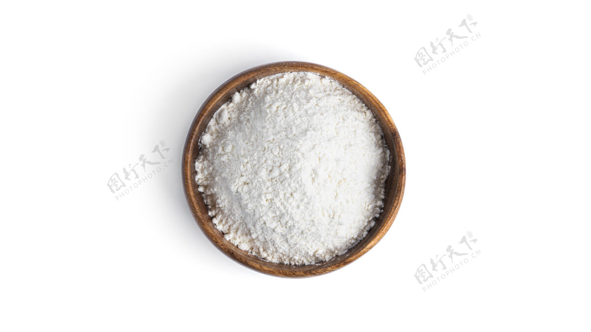 燕麦把面粉放在一个木碗里 放在一个白色的盘子里背景高高质量的照片谷物谷类生的