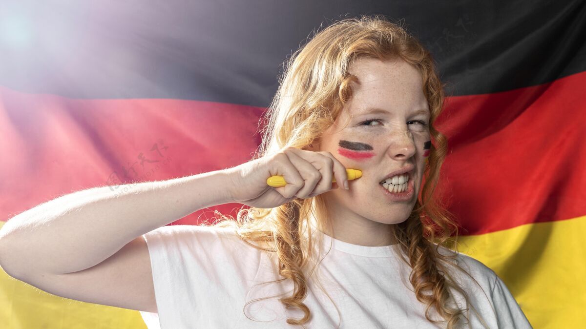 水平在脸上画德国国旗的女人足球比赛德国国旗德国